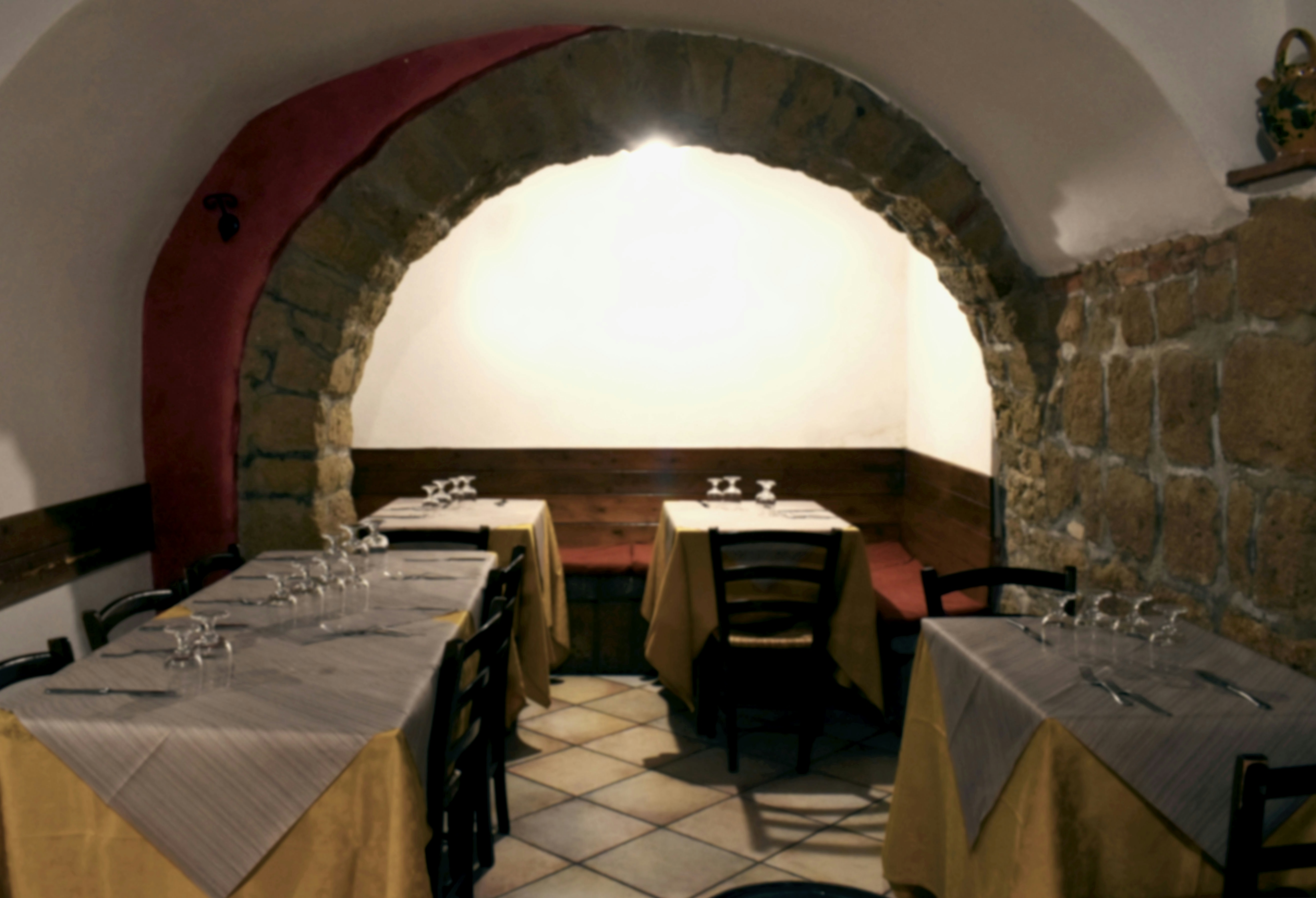 header image with table and chairs of Voltarella restaurant